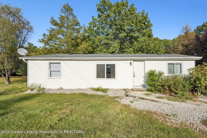 Property Photo:  9991 W Stoll Road  MI 48840 