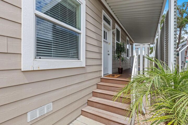 Property Photo:  9500 Harritt Rd 29  CA 92040 