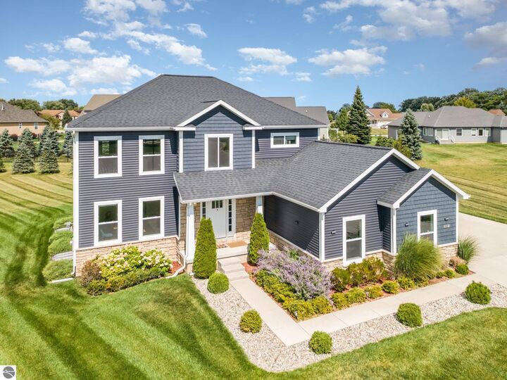 Property Photo:  2275 Sandstone Drive  MI 48858 