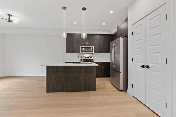 Property Photo:  292 Waterford Way  AB T1X 2Z9 