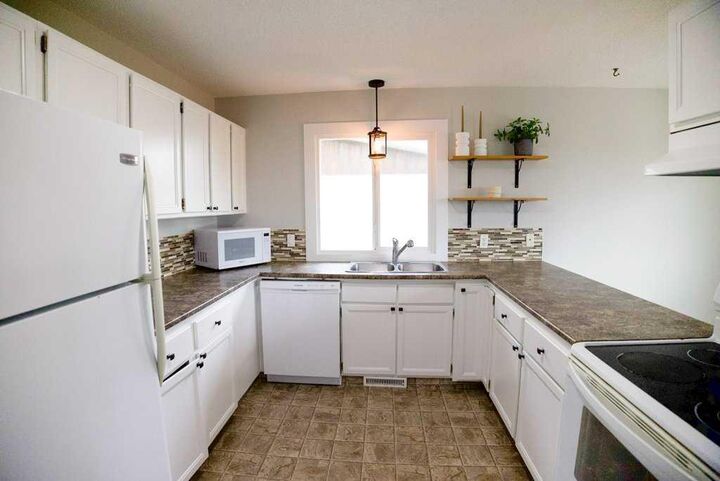 Property Photo: 12 Eagle Road AB T4L 1R3