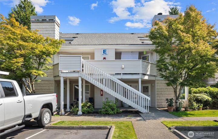 Property Photo:  9210  Market Place E102  WA 98258 