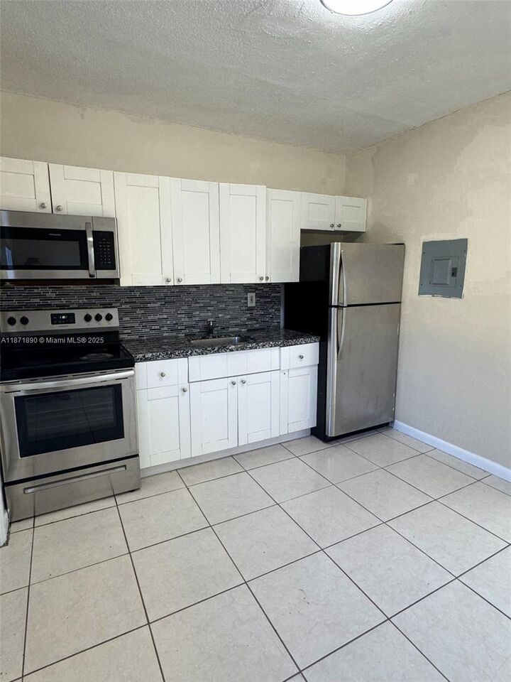 Property Photo: 3737 NW 20th Ave 3737 FL 33142