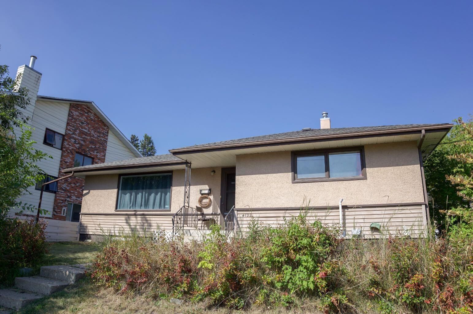 Property Photo: 4122 50 Street AB T4N 1W7