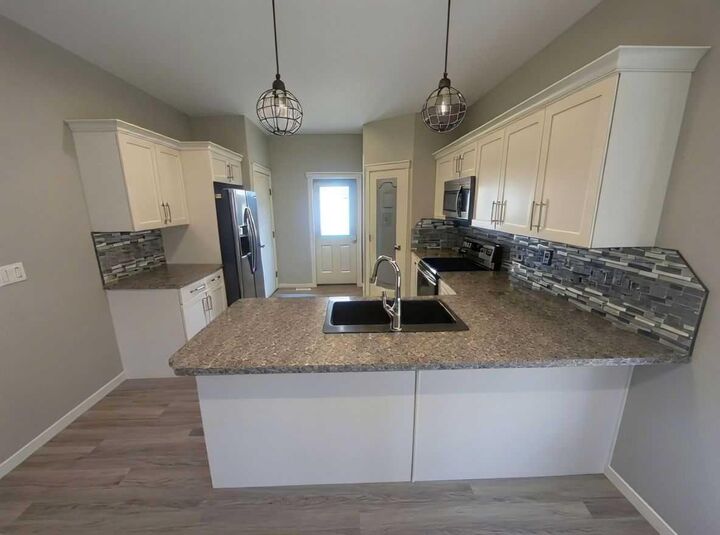 Property Photo: 115 Aurora Heights AB T4M 0M6