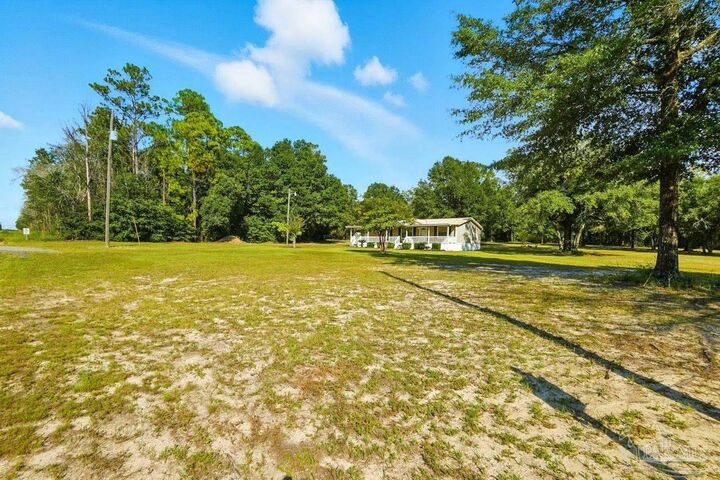 Property Photo: 7880 Munson Hwy FL 32570