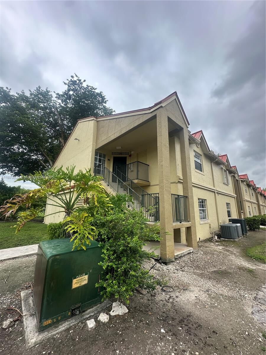 Property Photo:  18318 NW 68th Ave B  FL 33015 