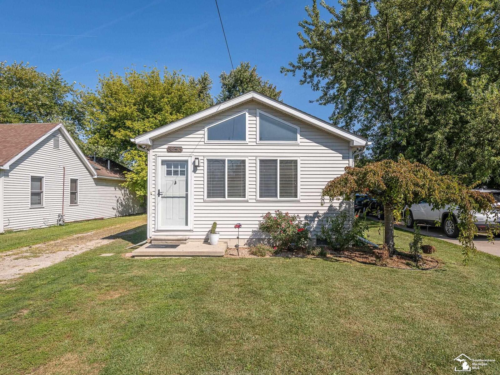 Property Photo:  8353 N Dixie Highway  MI 48166 