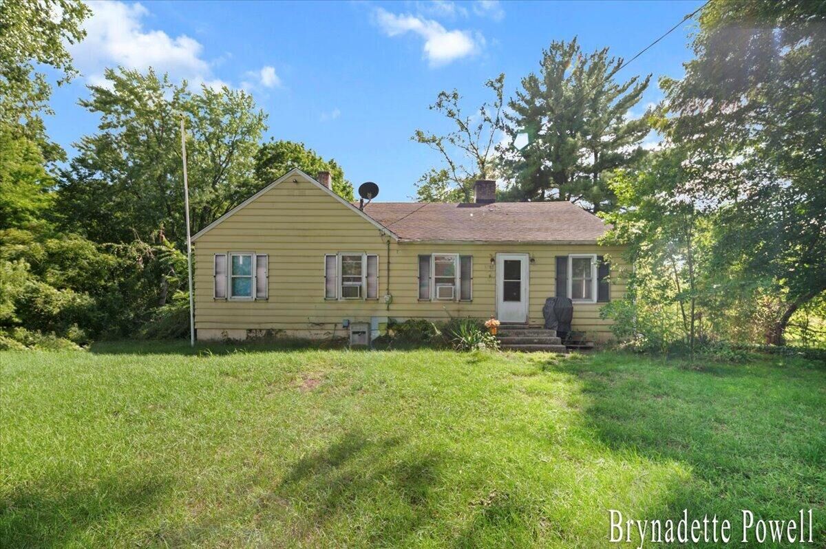 Property Photo:  5788 W River Road  MI 49306 