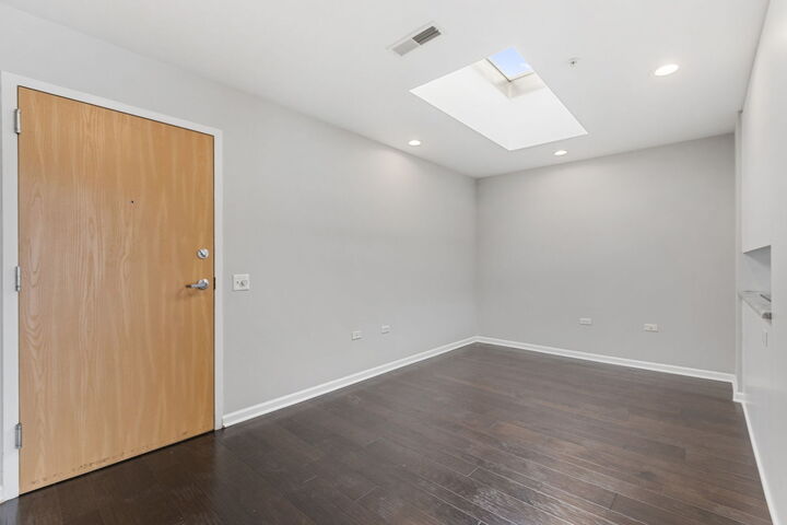Property Photo:  1800 Dewes Street 312  IL 60025 