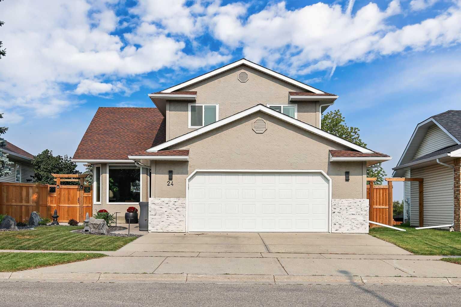 Property Photo:  24 Westridge Drive SW  AB T1S 1N2 