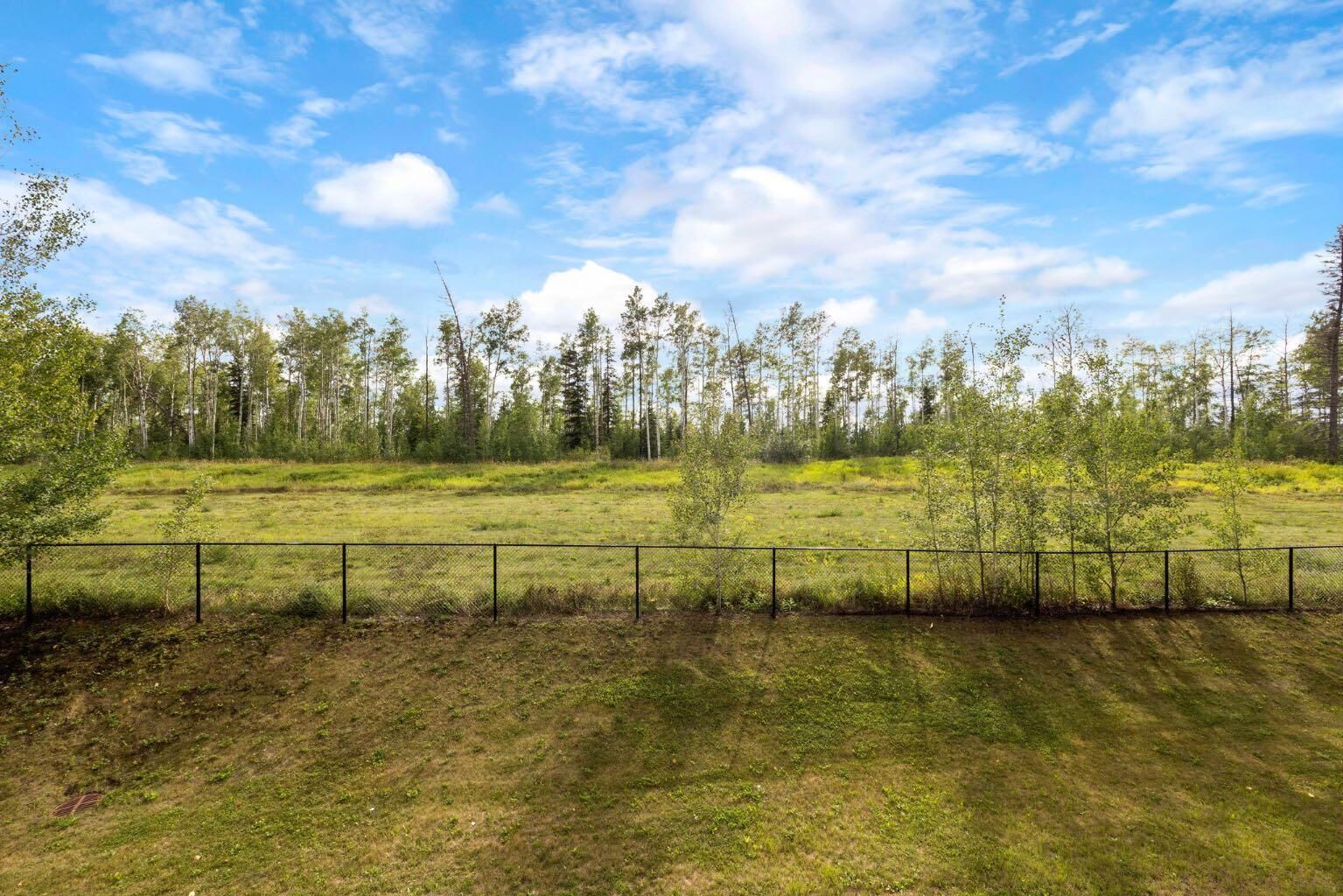 Property Photo: 204 Sparrow Hawk Drive 2209 AB T9K 0P1