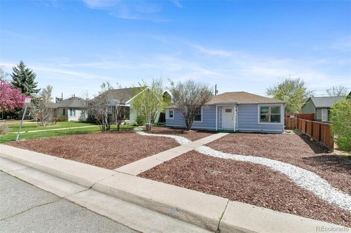 Property Photo:  1740 Trenton Street  CO 80220 