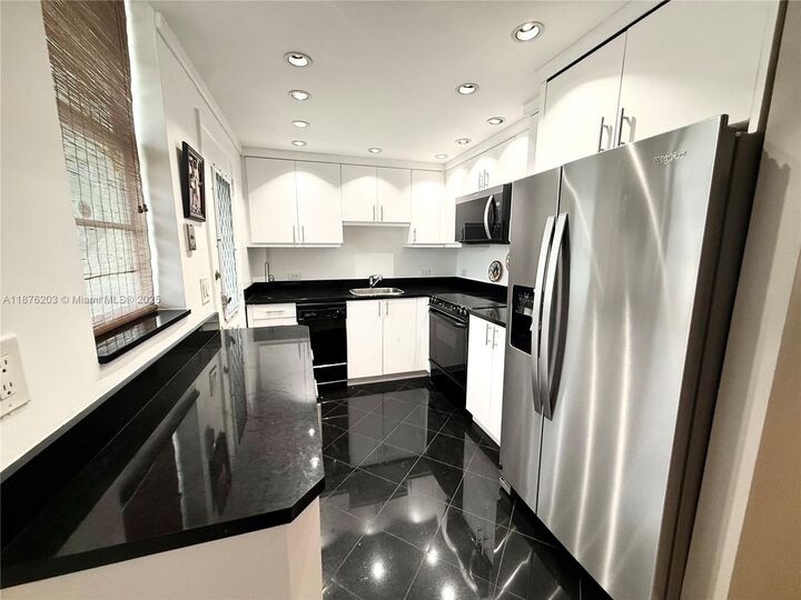 Property Photo:  3020 Marcos Dr S203  FL 33160 