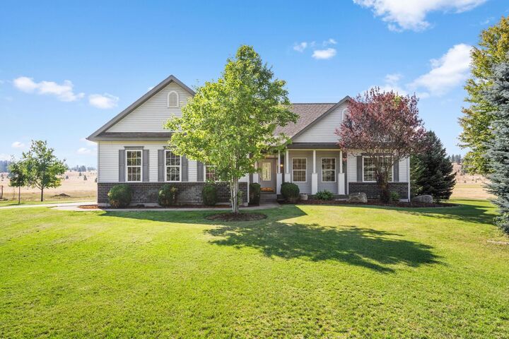 Property Photo:  6915 W Rutter Pkwy  WA 99208 