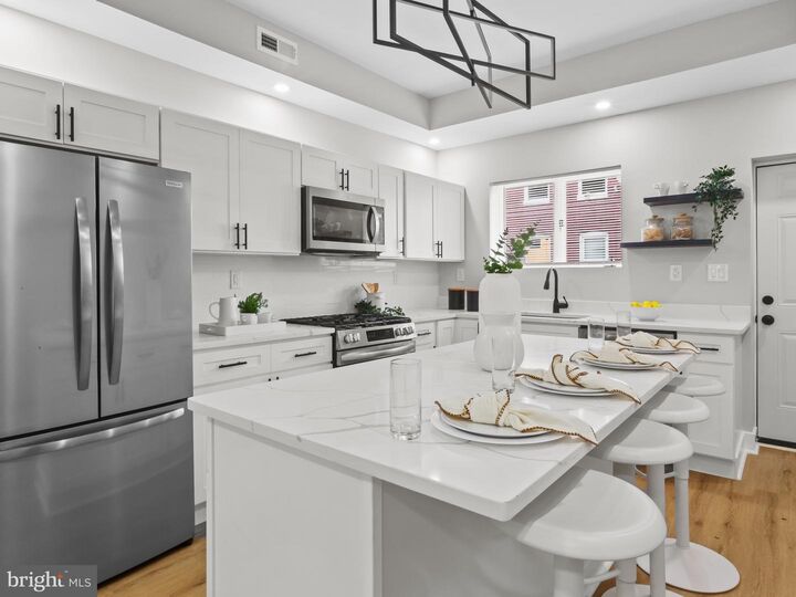 Property Photo:  5 N Clinton Street  MD 21224 