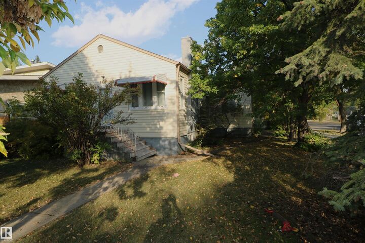 Property Photo:  11303 St Albert Trail NW  AB T5M 3L2 