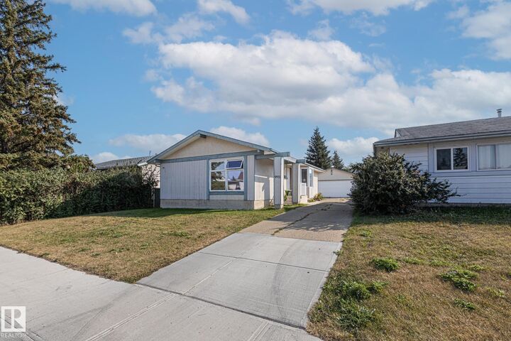 Property Photo:  9911 170 Avenue NW  AB T5X 3G3 