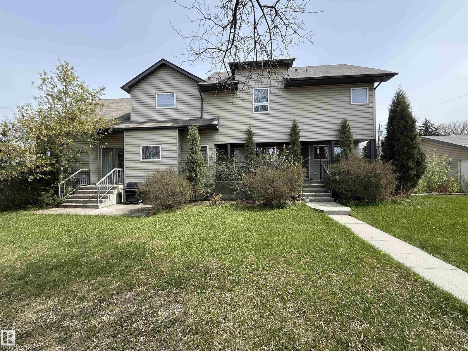 Property Photo:  10651 68 Ave And 6711 107 Street Avenue NW  AB T6H 2B3 