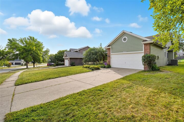 Property Photo:  8824 Long Meadow Drive  IA 50131 