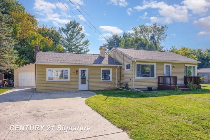 Property Photo:  323 Sparling Drive  MI 48609 
