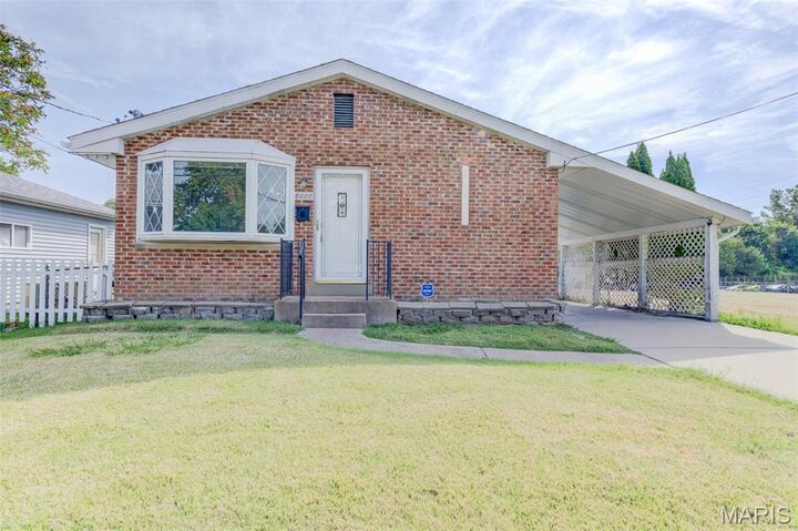 Property Photo: 6008 Jackson Avenue MO 63134