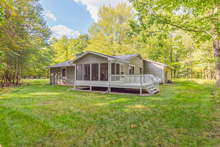Property Photo:  6327 Clubhouse Drive E  MI 49346 