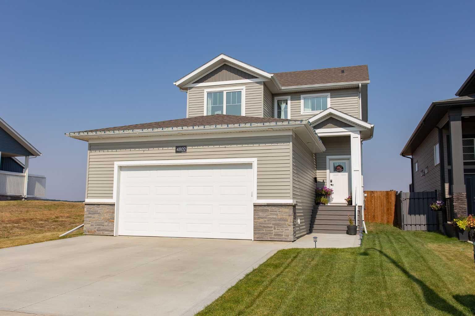 Property Photo:  4802 Aspen Lakes Boulevard  AB T4M 0M8 