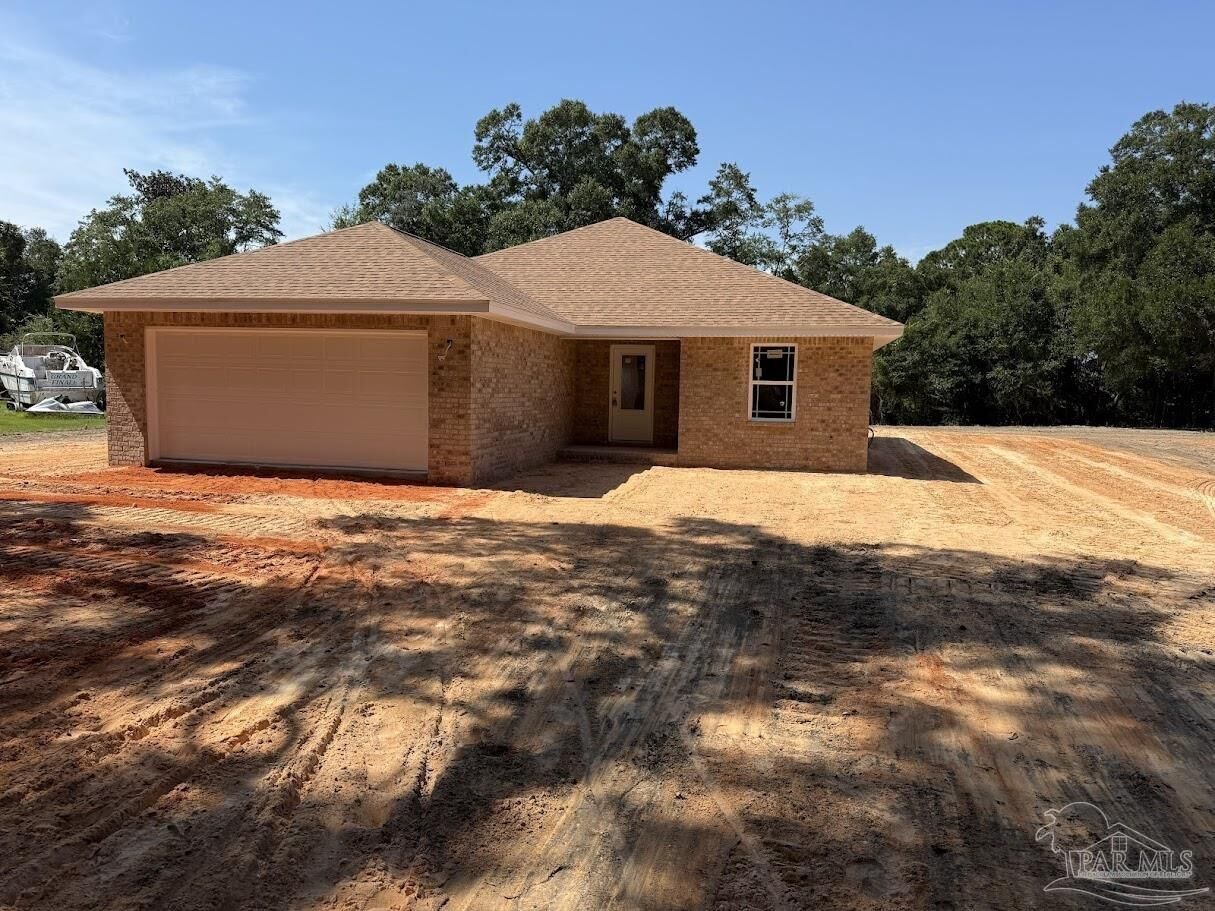 Property Photo: 7610 Homerun Rd FL 32583