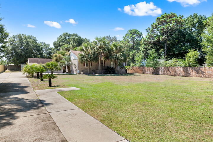 Property Photo:  8365 Calle Mio  FL 32566 