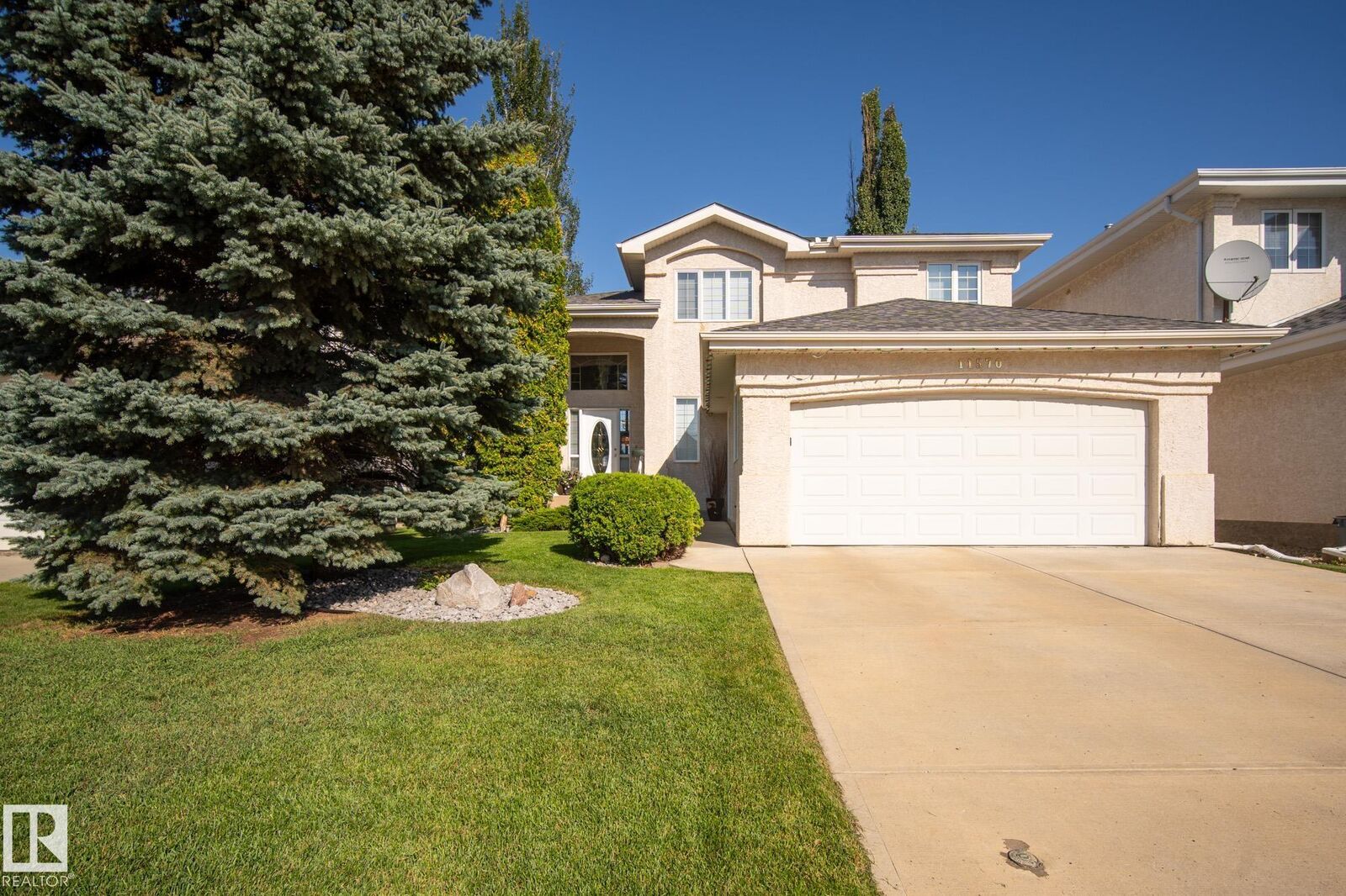Property Photo:  11570 13 Avenue NW  AB T6J 7B3 