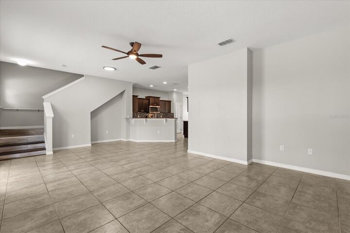 Property Photo:  4850 Poolside Drive  FL 34769 
