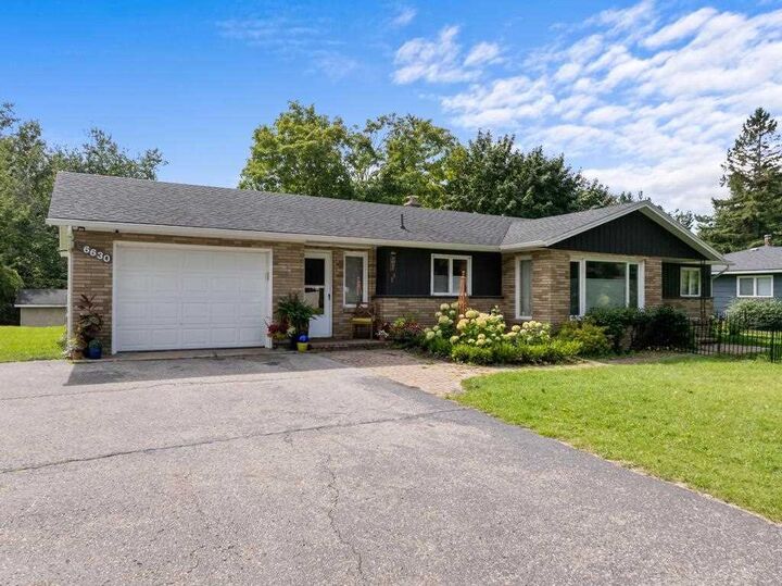 Property Photo:  6630 S US-31  MI 49720