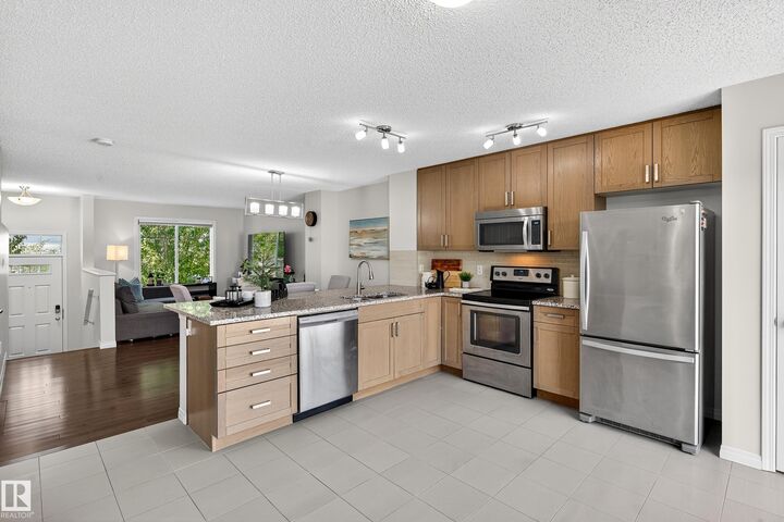 Property Photo: 1140 Chappelle Boulevard SW 20 AB T6W 2Z3