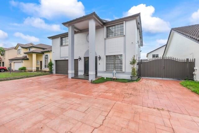 Property Photo: 18811 NW 80th Ave FL 33015