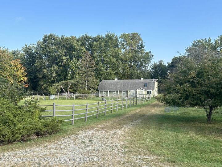 Property Photo:  346 Wind N Wood Drive  MI 48864 