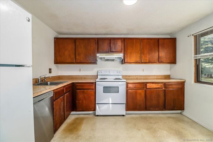 Property Photo:  7 Padanaram Road D98  CT 06811 
