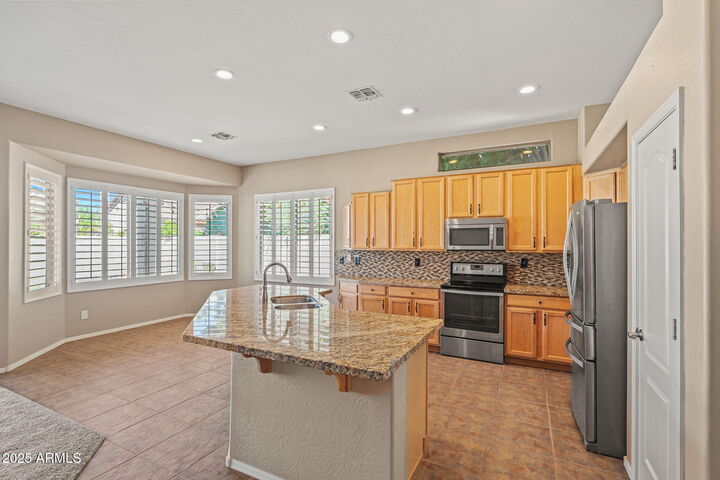 Property Photo:  6052 W Kristal Way  AZ 85308 