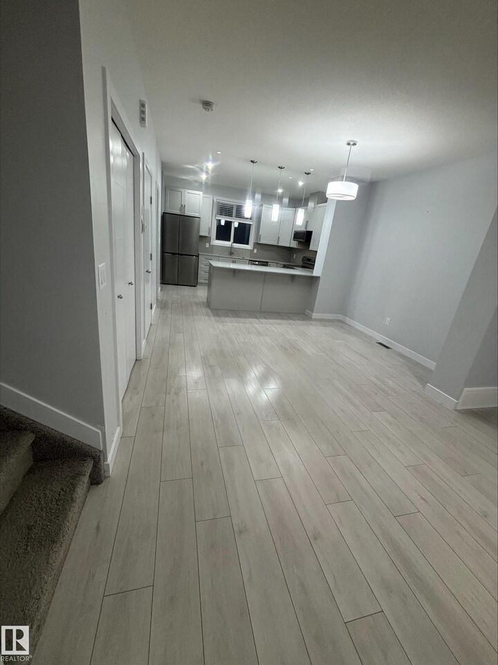 Property Photo: 828 Northern Harrier Lane NW AB T5S 0P8