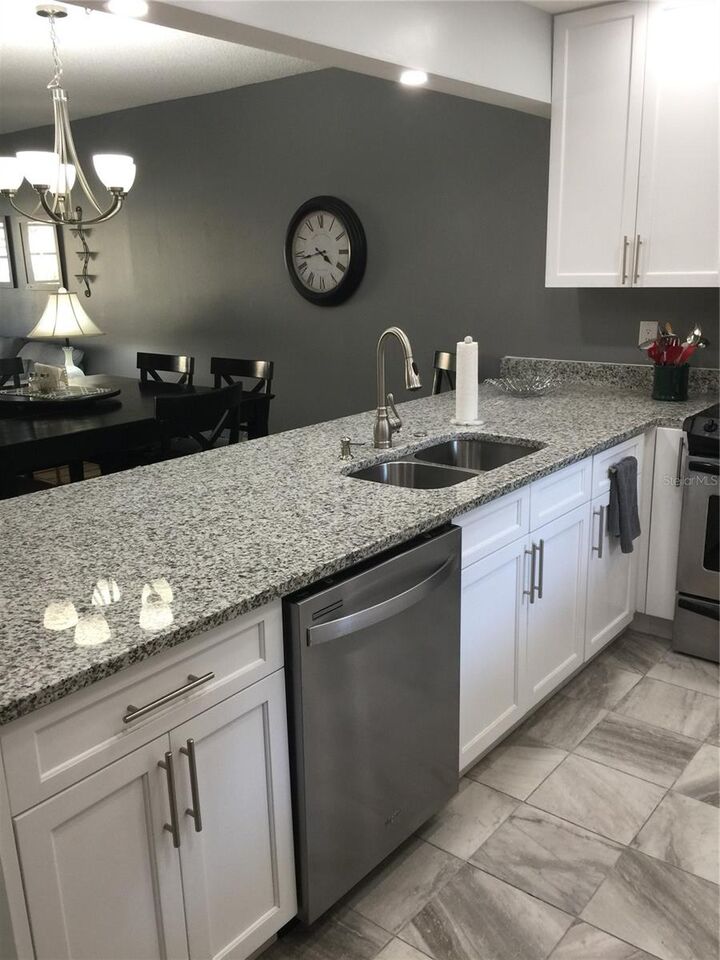 Property Photo: 10215 Regal Drive 14 FL 33774