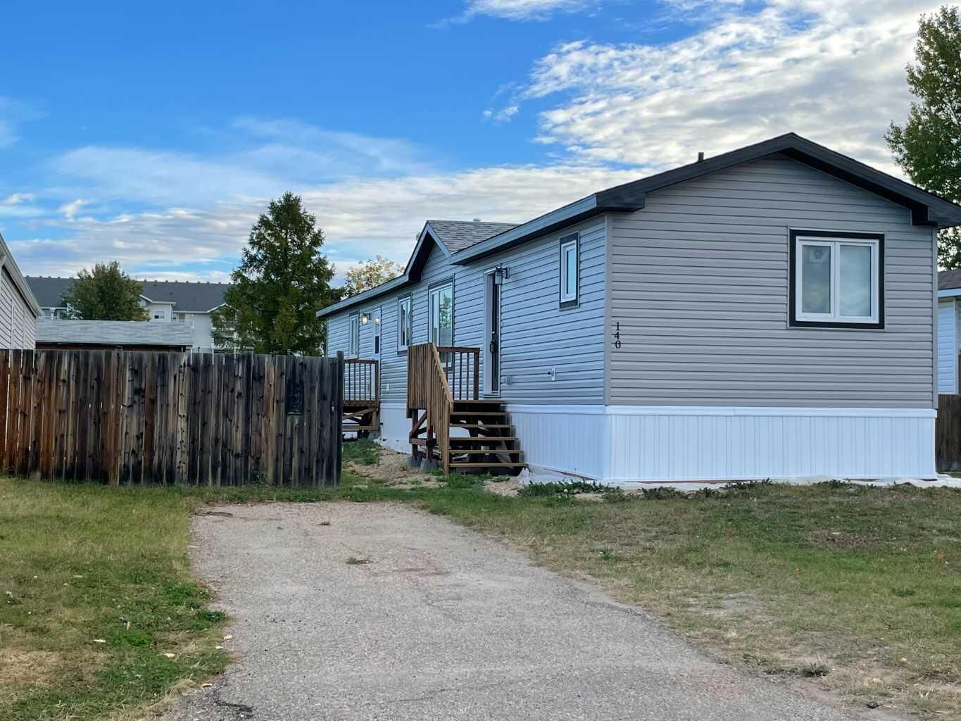 Property Photo: 140 Caouette Crescent AB T9K 2H5