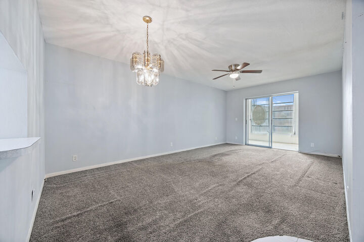 Property Photo:  230 NE 26th Avenue 206  FL 33435 
