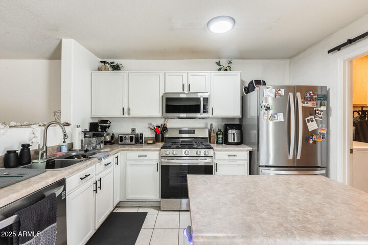 Property Photo: 16011 W Monroe Street AZ 85338
