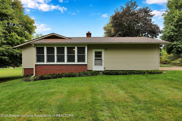 Property Photo:  1404 W Stoll Road  MI 48820 