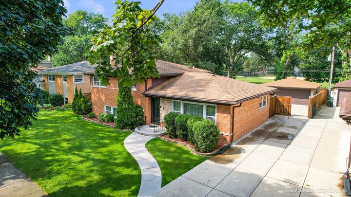 Property Photo:  9224 Menard Avenue  IL 60053 