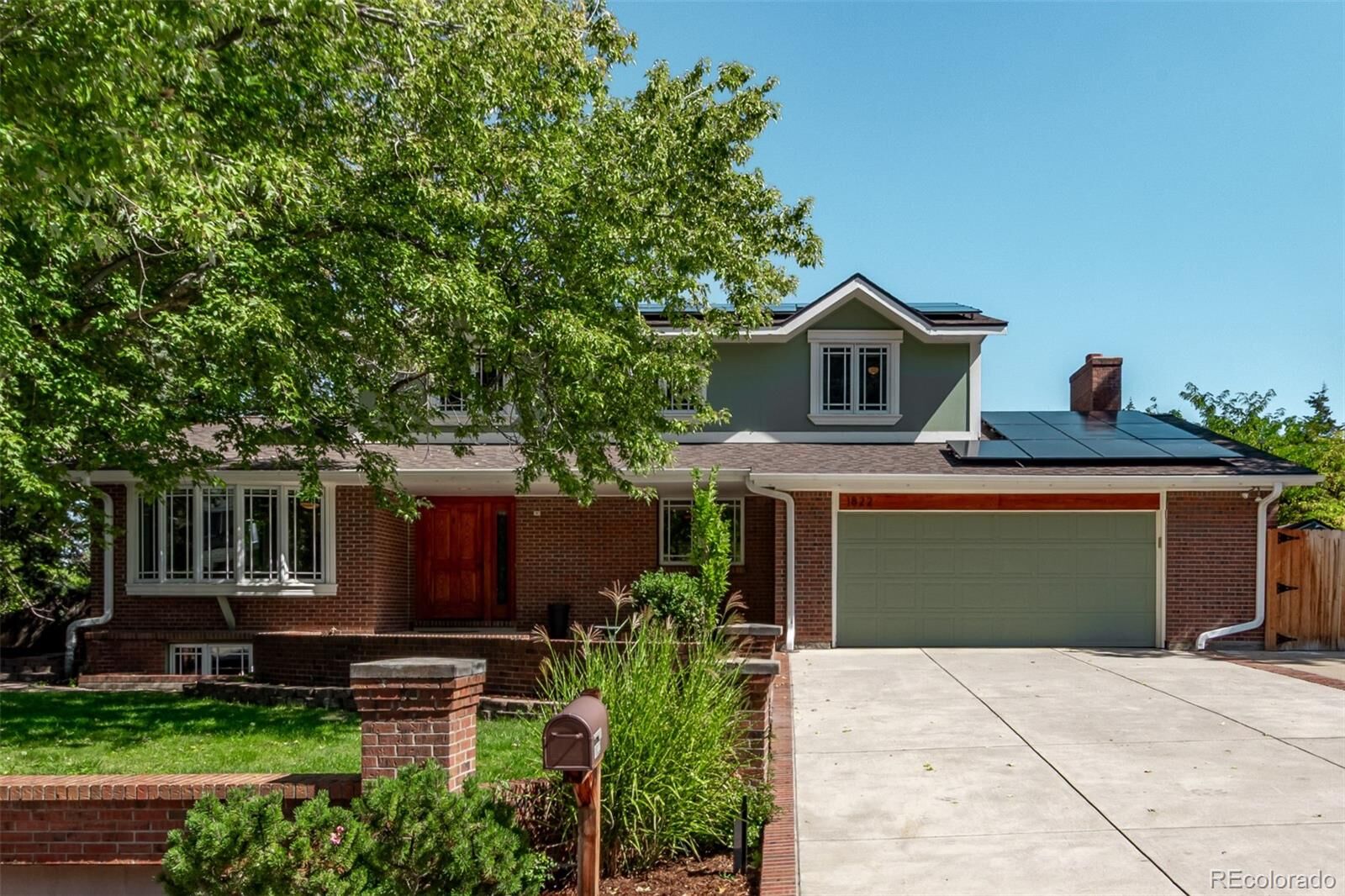 Property Photo: 1822 S Robb Street CO 80232