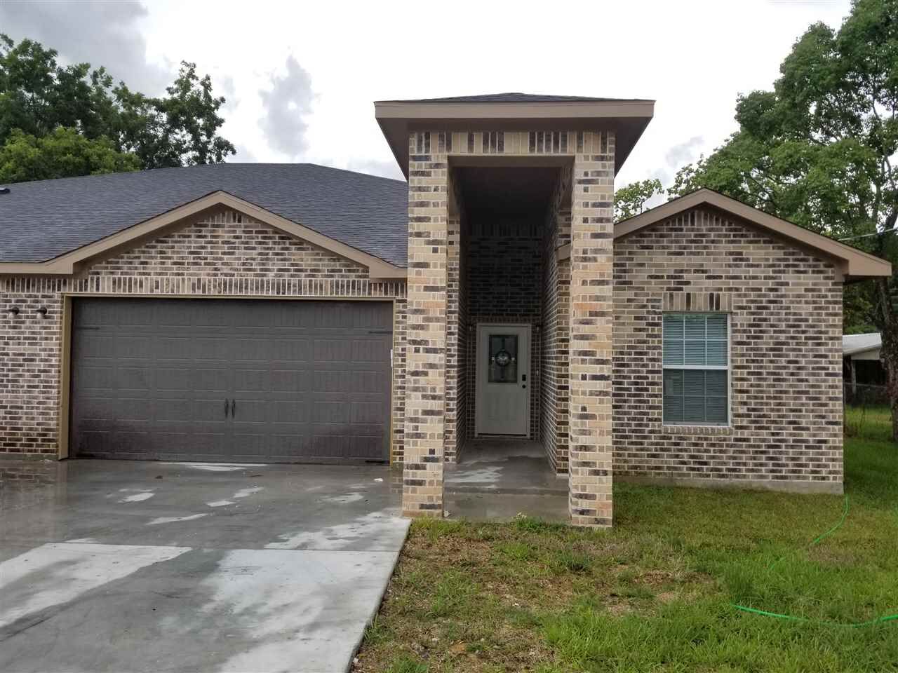 Property Photo:  8575 Hwy 105 Suite B.  TX 77713 