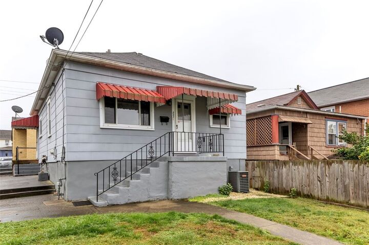 Property Photo:  323 Sycamore Street  PA 15690 