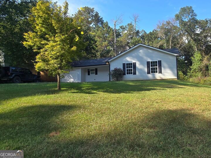Property Photo:  915 Navajo Trail  GA 30016 