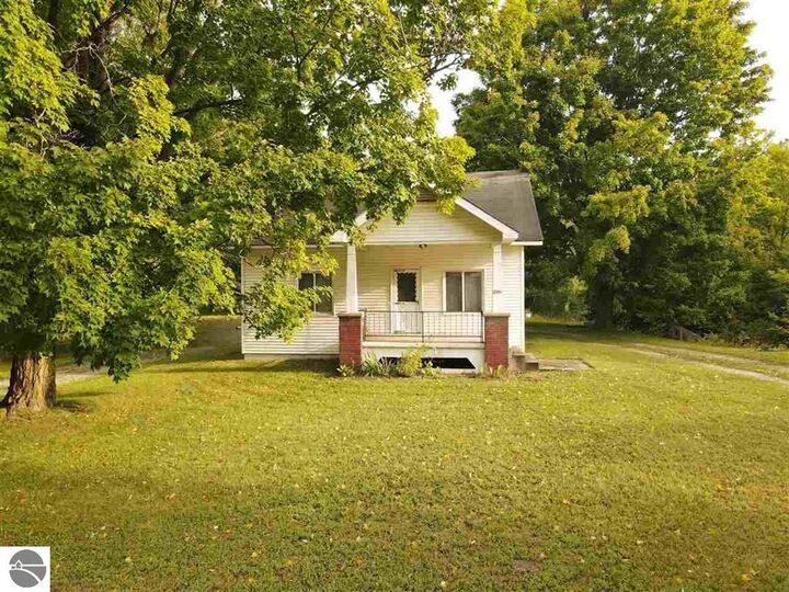 Property Photo:  6980 Church Street  MI 49729 